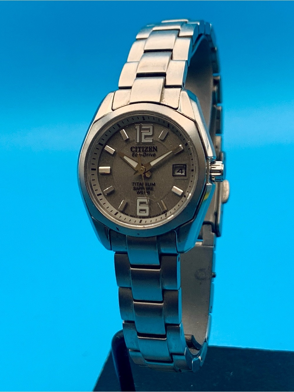 CITIZEN ECO-DRIVE E011-S068479 Women’s Solar Watch Titanium Sapphire Date Works